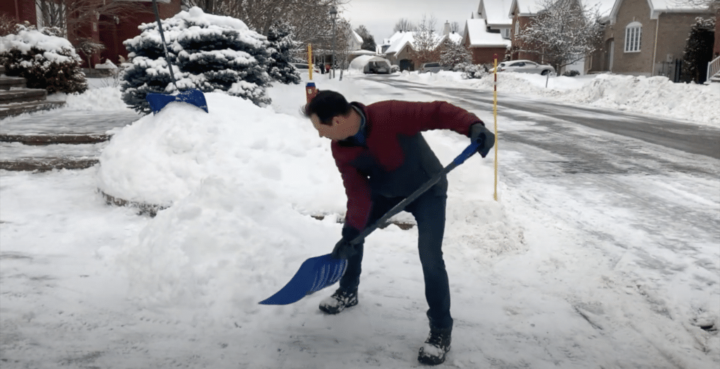 back pain shoveling snow